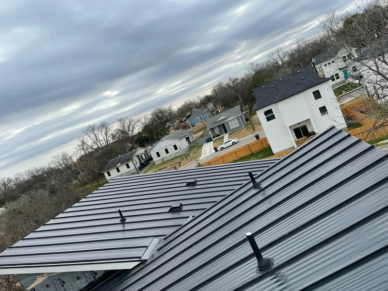 Standing seam metal roof panels with vents for Skylight Repair in Longmont